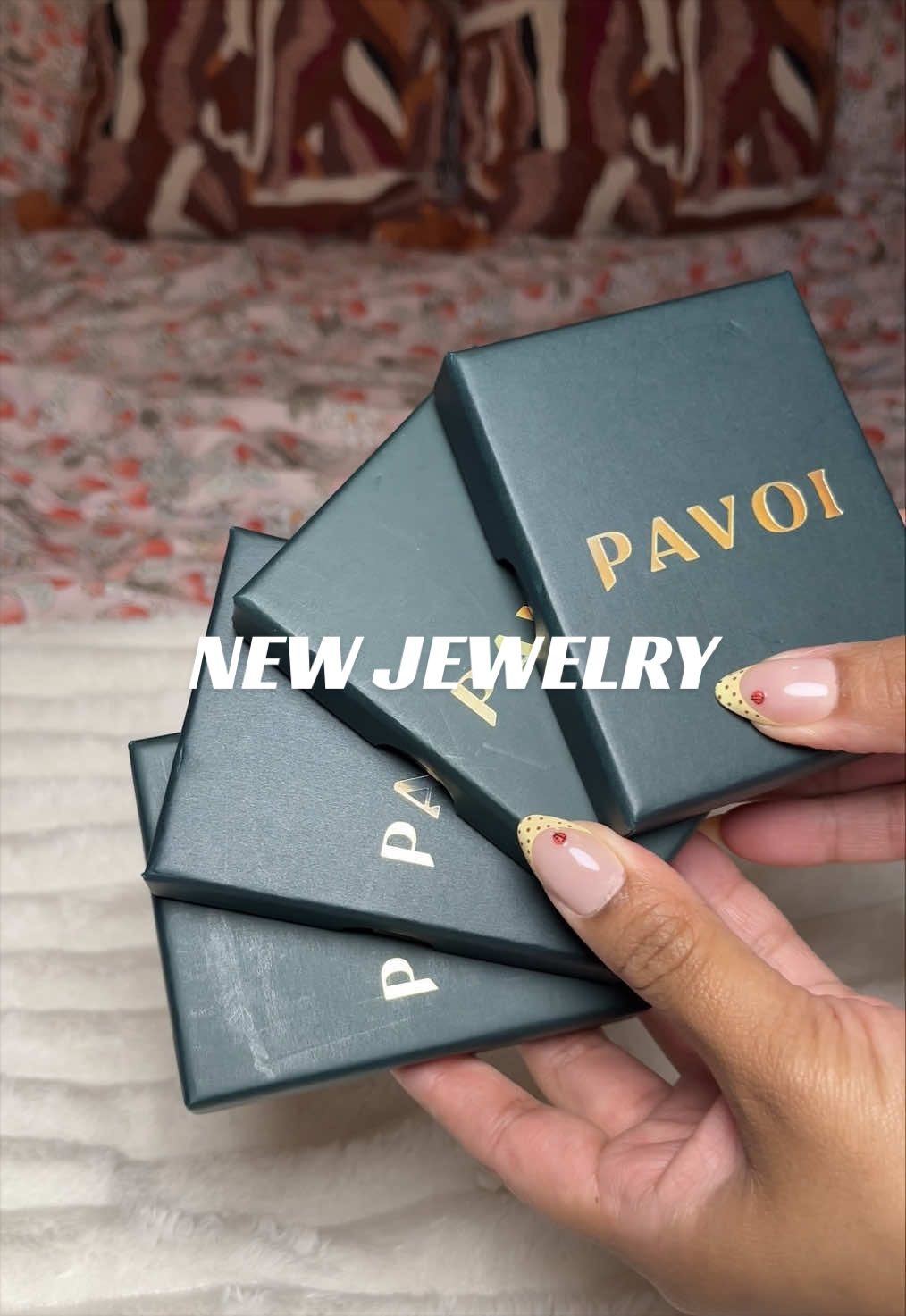 TikTok post by @elized__ for Pavoi. Caption reads: Unboxing some new jewelry I just bought ✨ @PAVOI....