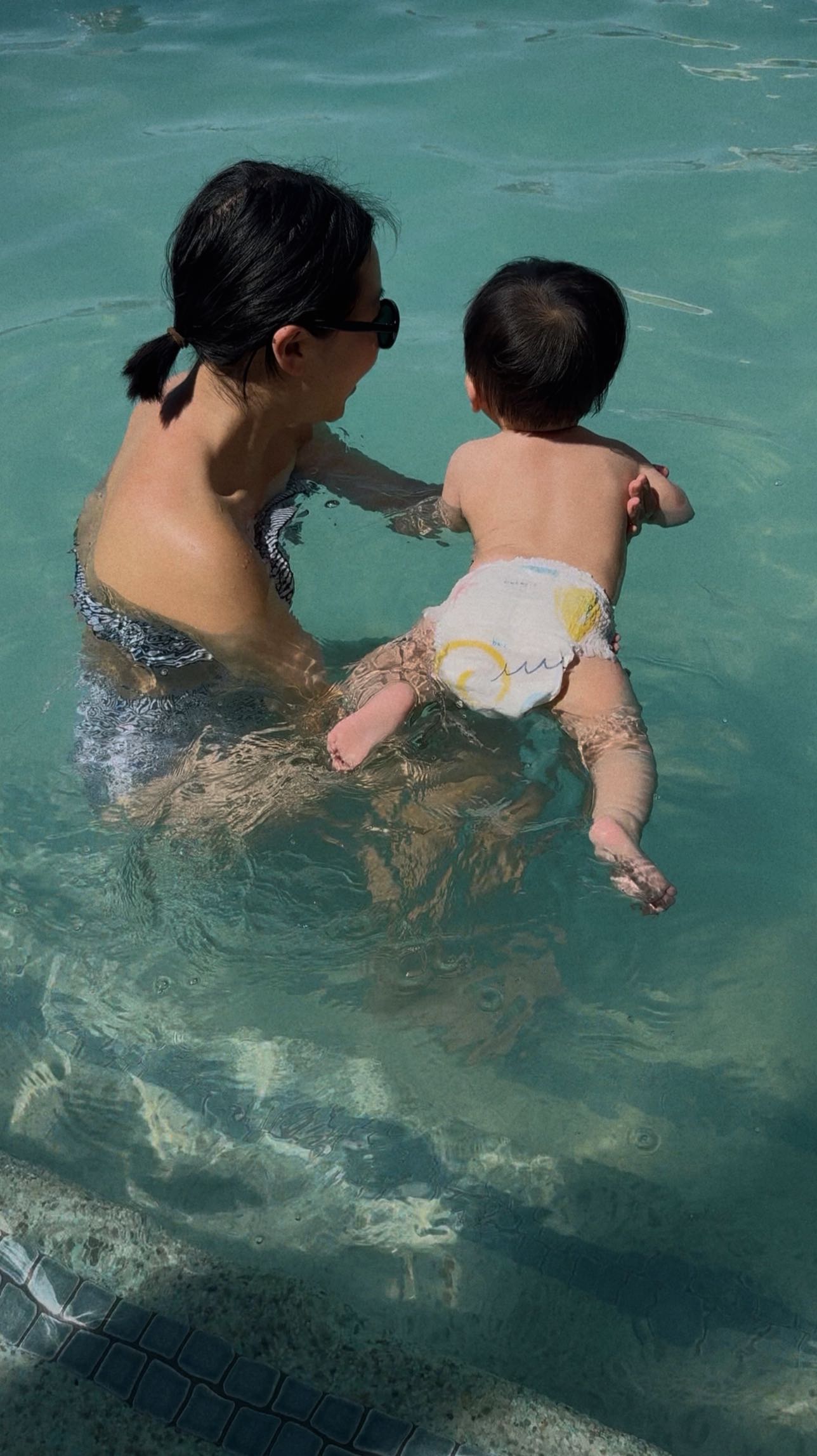 Instagram post by @esthersoyunpark for Coterie. Caption reads: Thank you @coterie for making Jude’s swim time....
