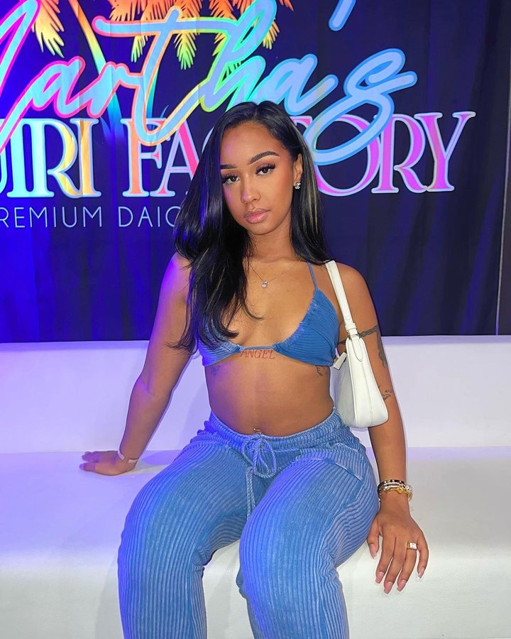 Instagram post by @ashantidestinyy for Edgebyks. Caption reads: Sitting pretty 🌺 
SET @edgebyks 

#explore #ad....