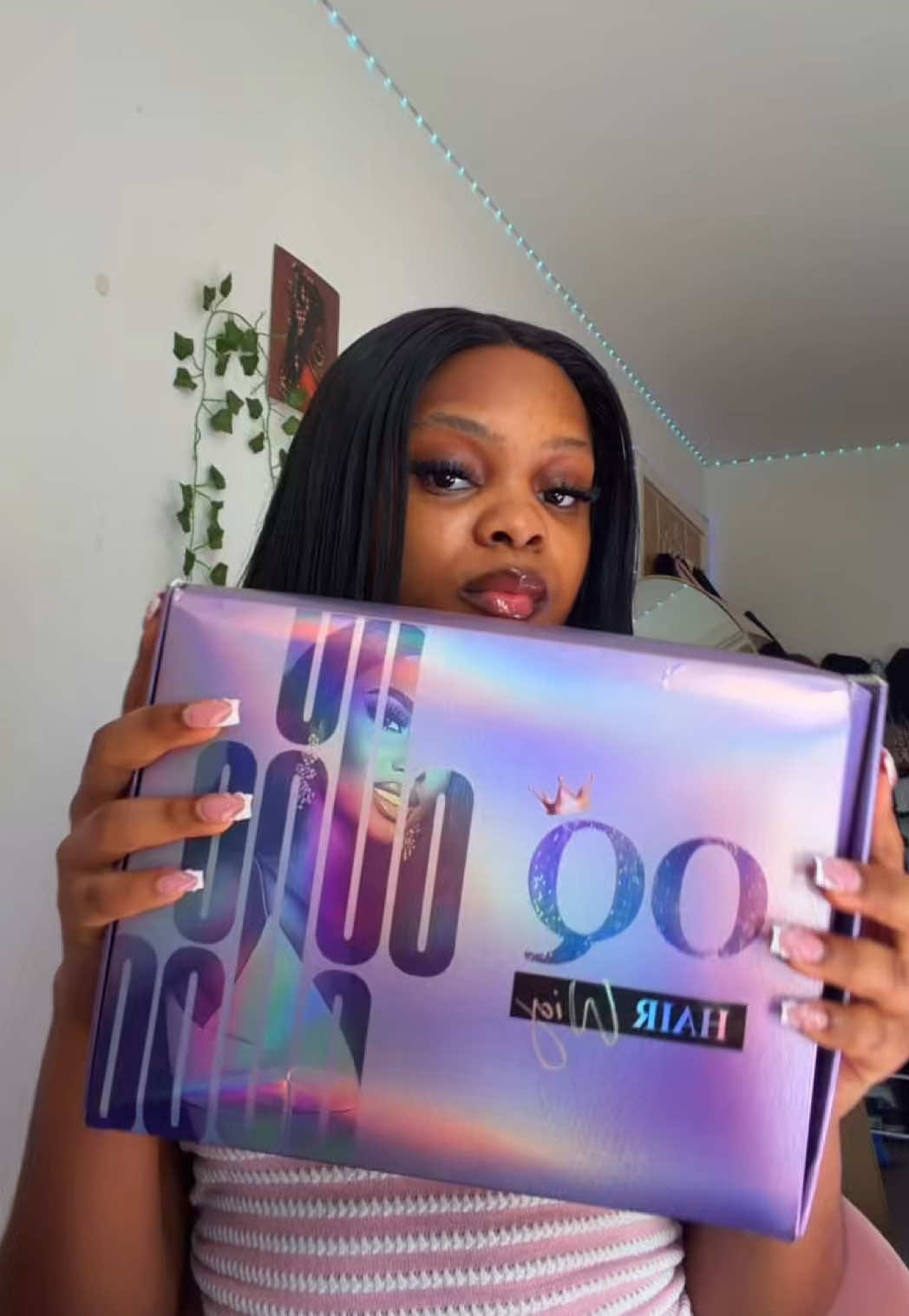TikTok post by @a.kianaaaa for OQ HAIR WIG. Caption reads: @OQ HAIR WIG Every girl needs at least one water....