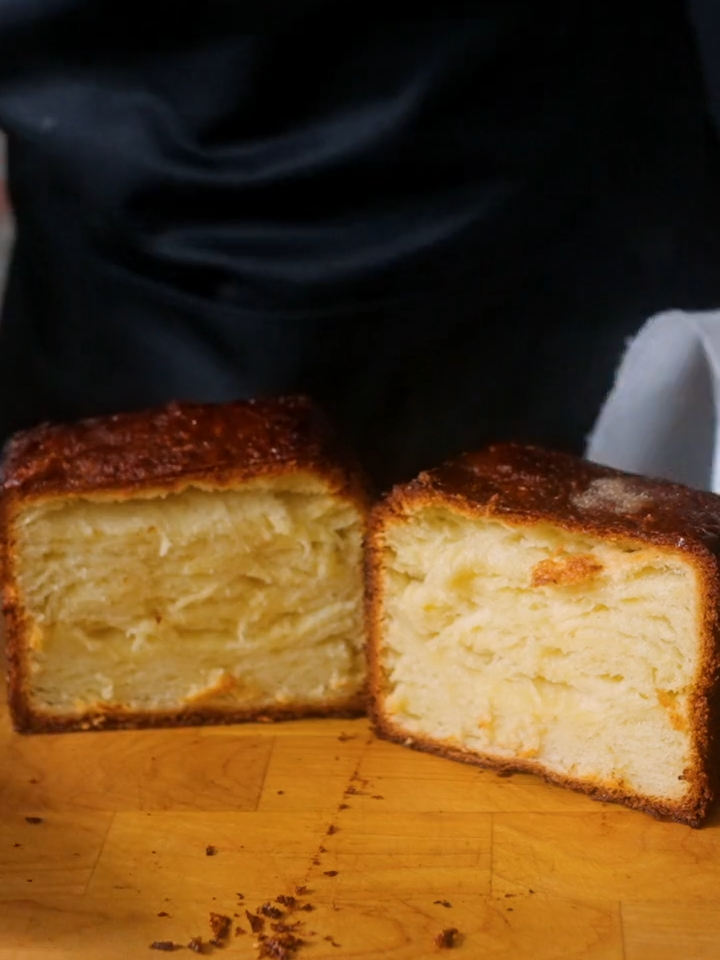 TikTok post by @babishculinaryuniverse for Danish Creamery. Caption reads: What's the secret ingredient to our 243-layer....