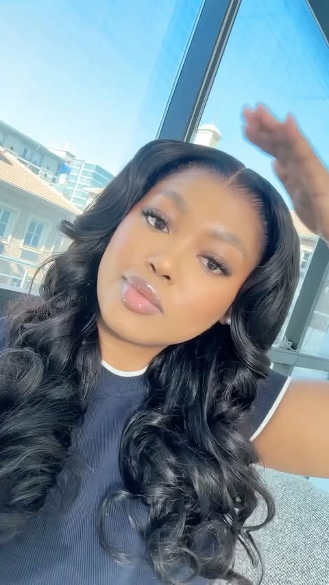 Instagram post by @zintle_tyingwa for Luvme Hair. Caption reads: When @luvmehair calls, you answer! 🤭💁🏽‍♀️ [...].
