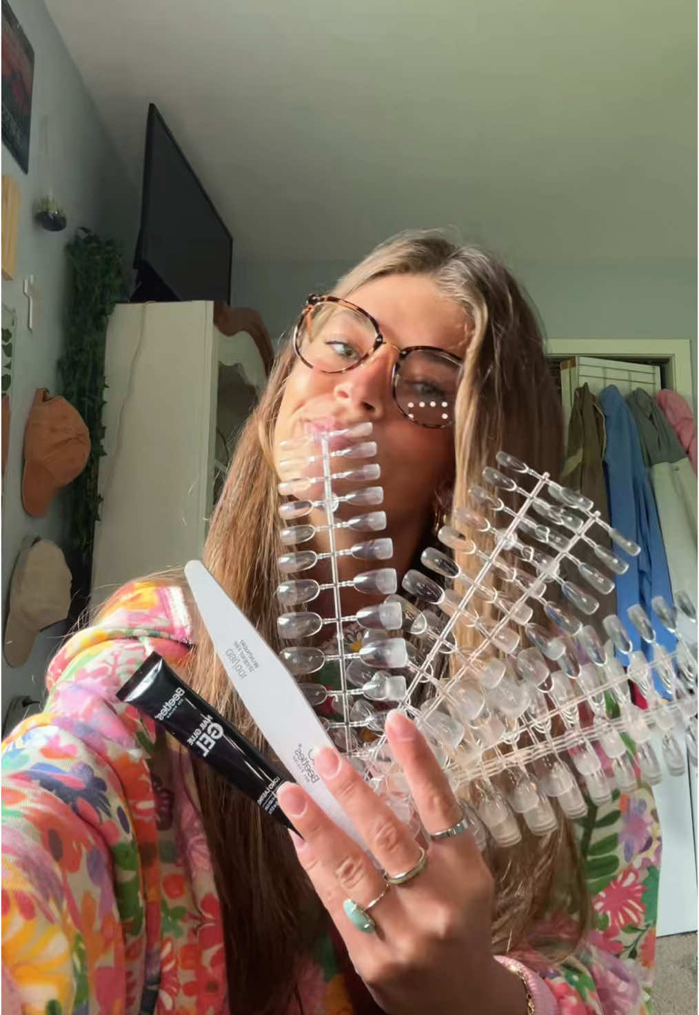 TikTok post by @karsynmeyering for BeetlesGelPolish. Caption reads: New nails with the @BeetlesGelPolish tipex nail....