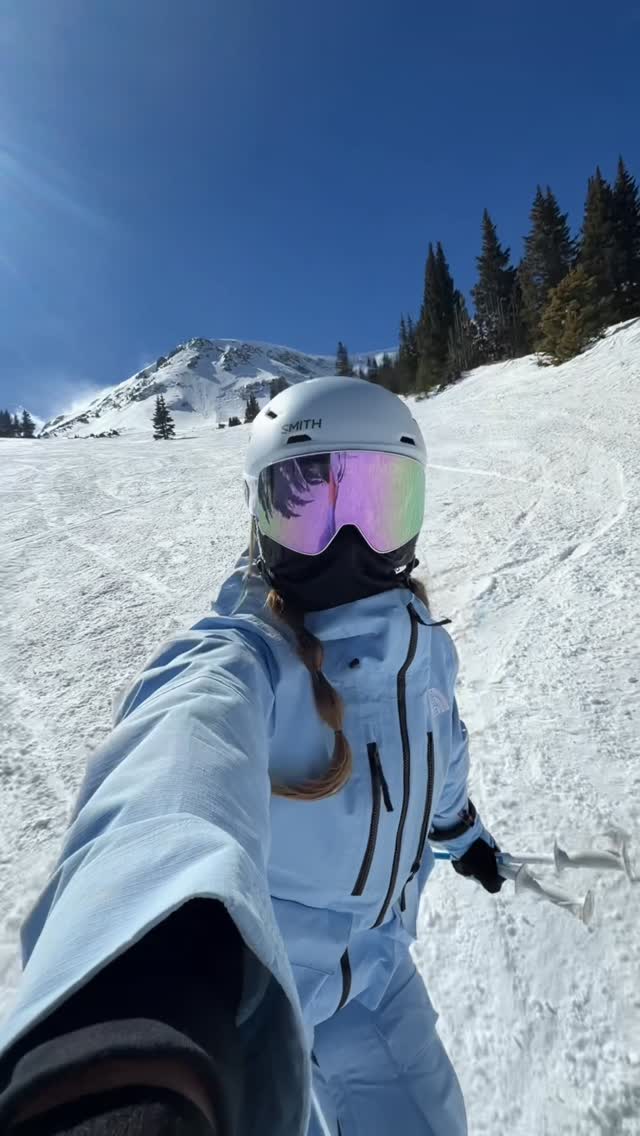 Instagram post by @hanncoleman for SMITH Optics. Caption reads: grwm to spring ski 🌸❄️🤍 bluebird days for the....