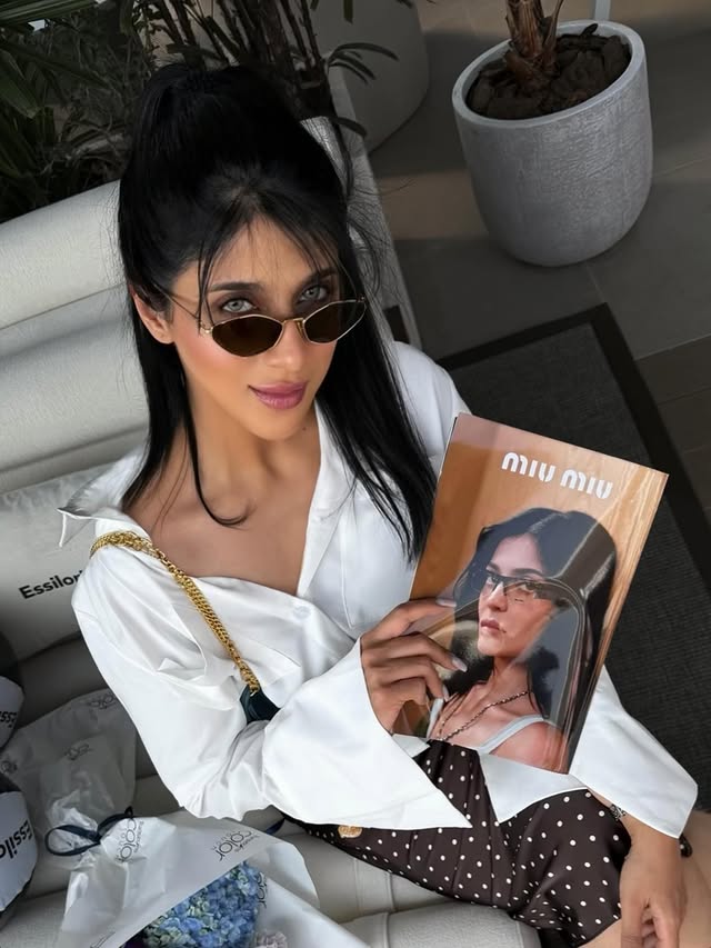 Instagram post by @zinobia.mistry for EssilorLuxottica. Caption reads: Always a @miumiu girl 🫰🏻

@essilorluxottica....