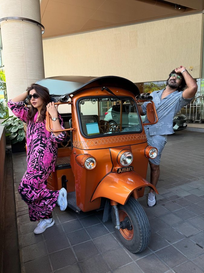 Instagram post by @nikkigalrani for GT Holidays. Caption reads: [...] & endless trails 🌎✨ Travel Partner....