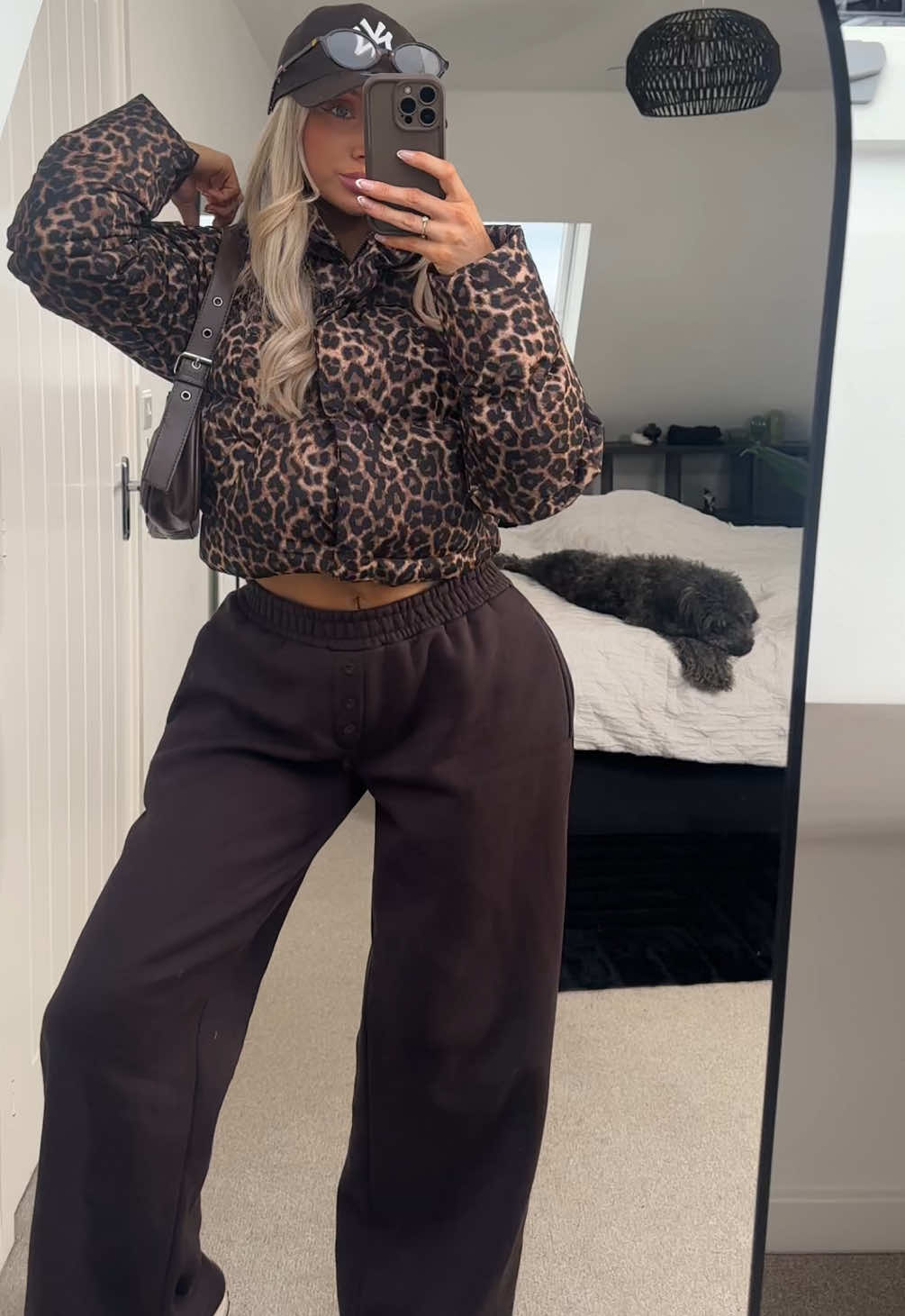 TikTok post by @indisparkes for Edikted. Caption reads: [...] for my favourite coat🐆🐆 she's perfect....