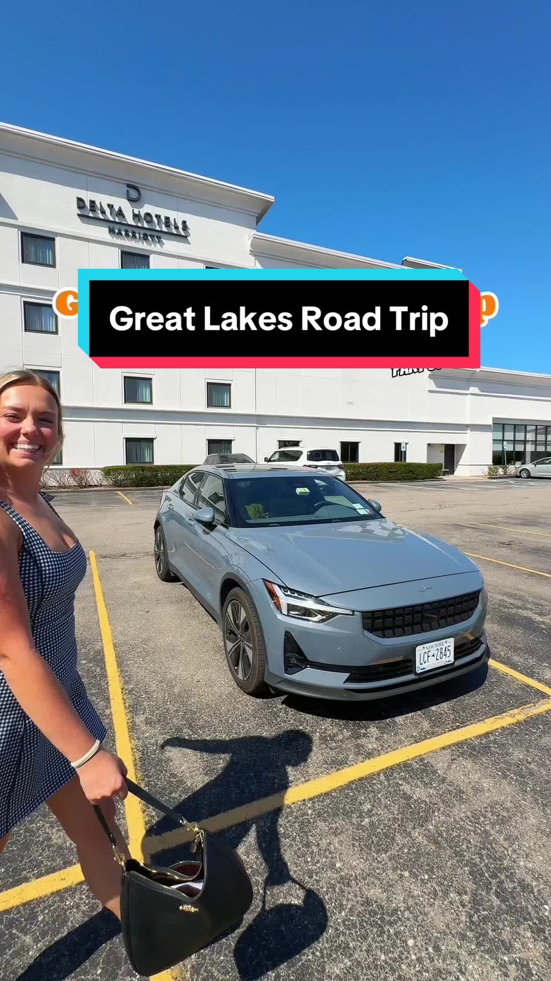 TikTok post by @thewanderingmichigander for Hertz. Caption reads: I’m on a road trip with @Delta Hotels by @Marriott....