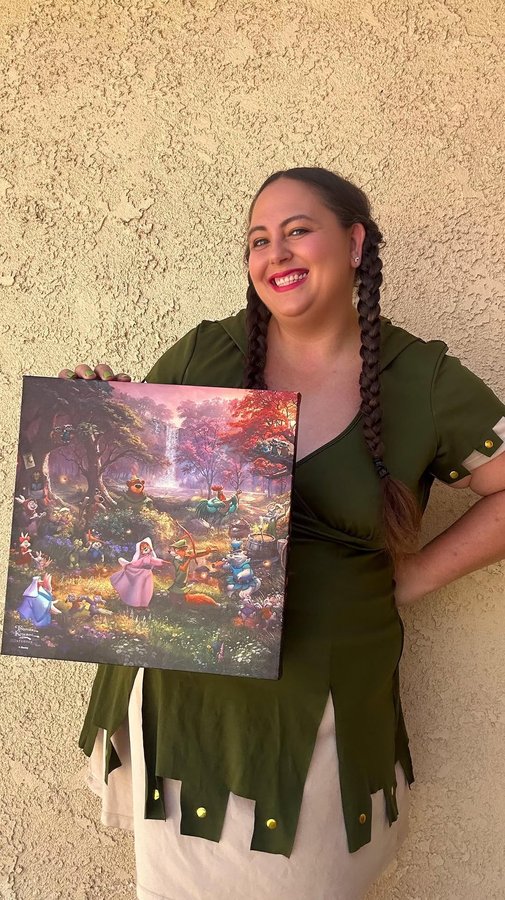 Instagram post by @sprinkledbymagic for Thomas Kinkade Studios. Caption reads: Let’s play a game [AD]

What you may not know is....