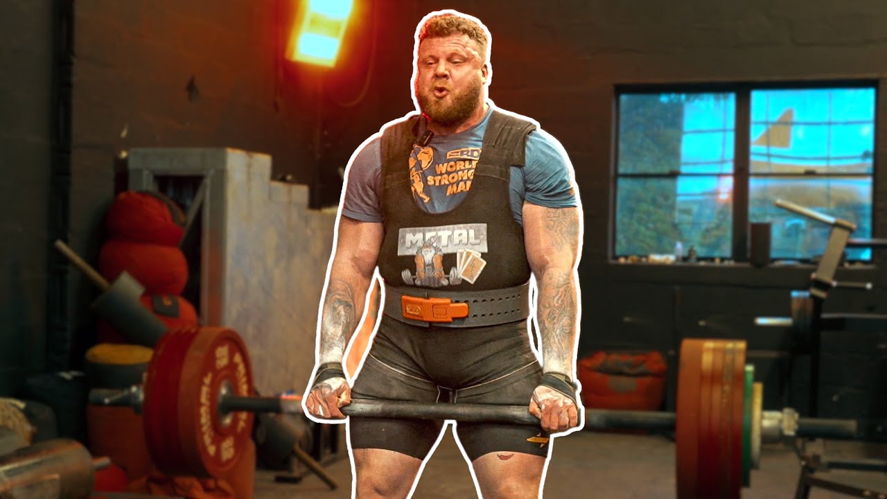 YouTube post by @StoltmanBrothers for SBD Apparel. Caption reads: How Many Reps Can World's Strongest Man Hit? 🥵.