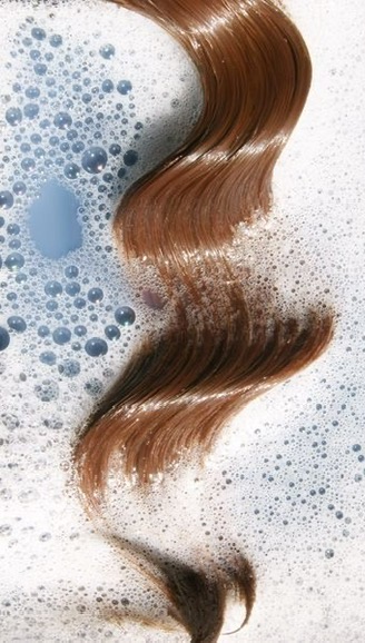 Instagram post by @mur.mur_style for Arganmidas. Caption reads: [...] in love with your hair again — with....