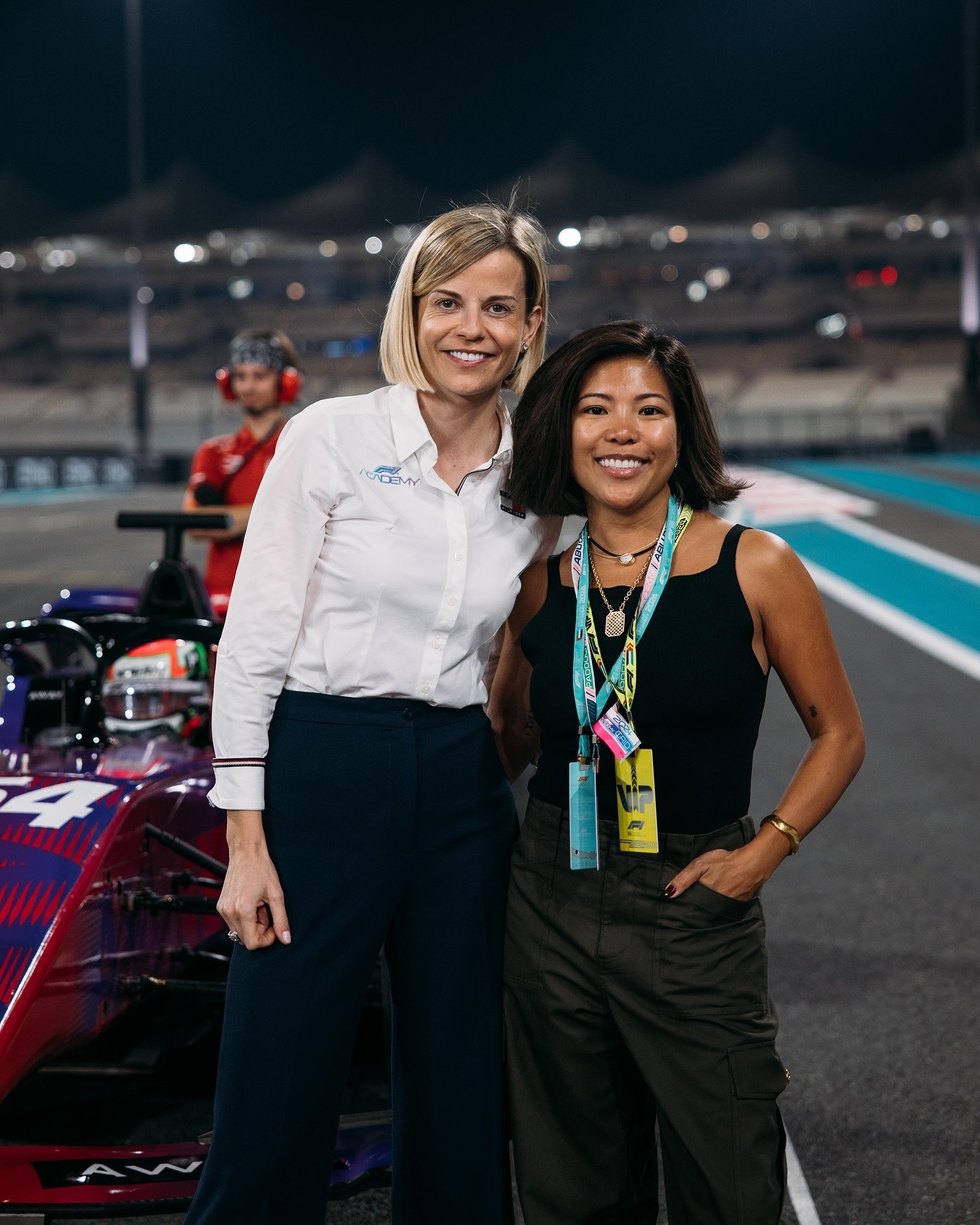Instagram post by @jennifer for Away. Caption reads: We flew around the world to Abu Dhabi Grand Prix....