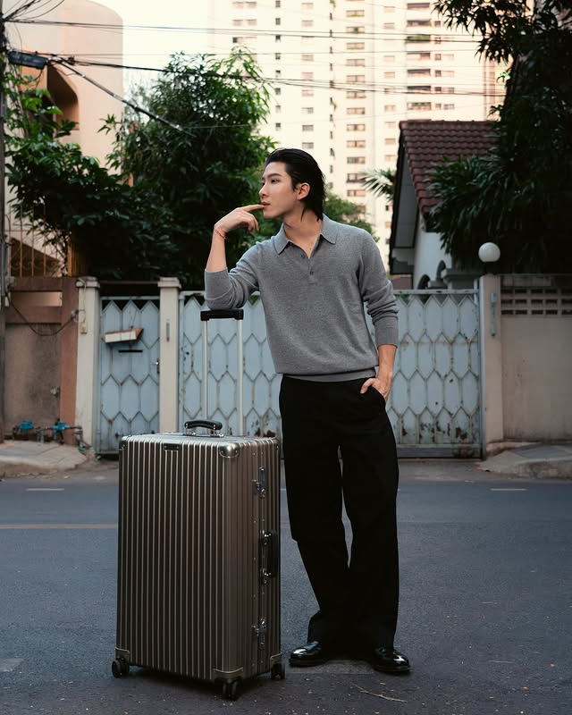 Instagram post by @khaotungg for RIMOWA. Caption reads: Effortlessly Classic @RIMOWA #RIMOWA....