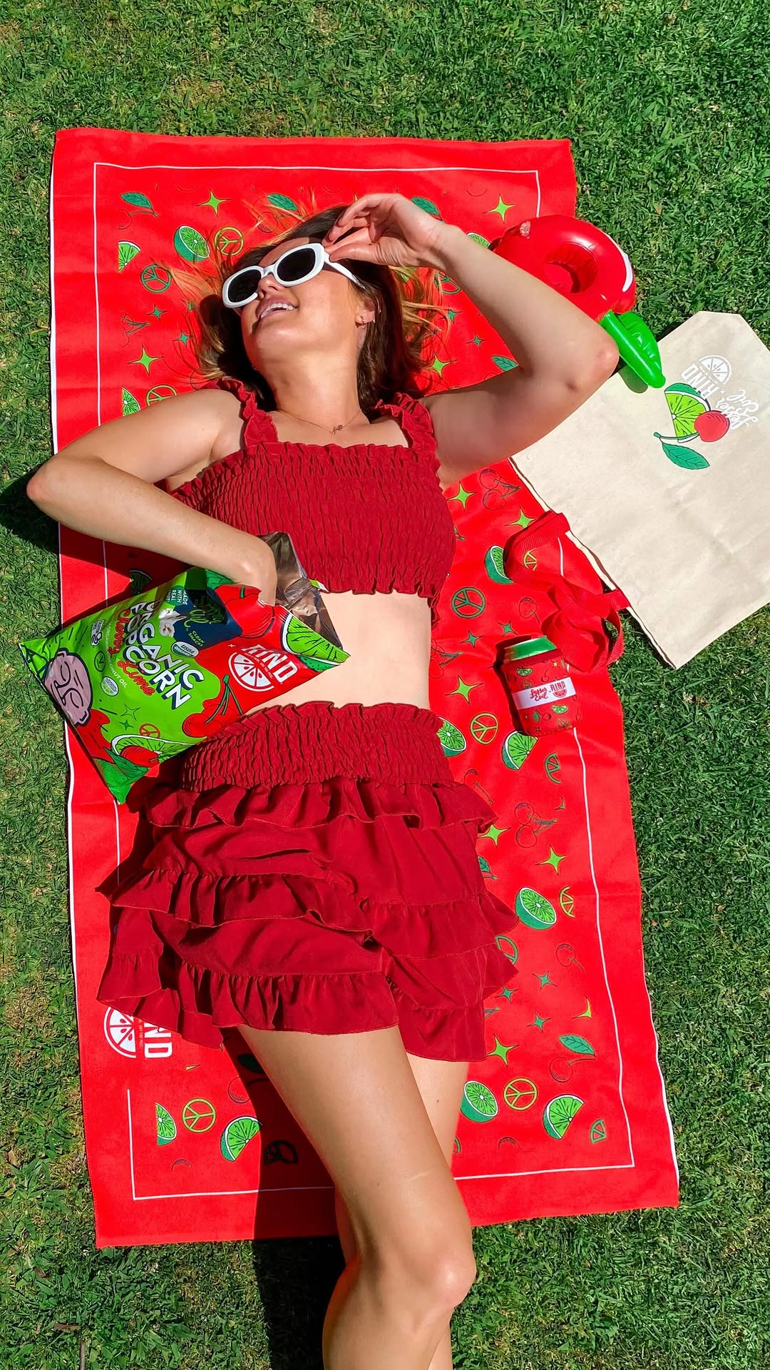 Instagram post by @rocknroamgirl for LesserEvil Kids. Caption reads: Getting into the summer grove with the newest....