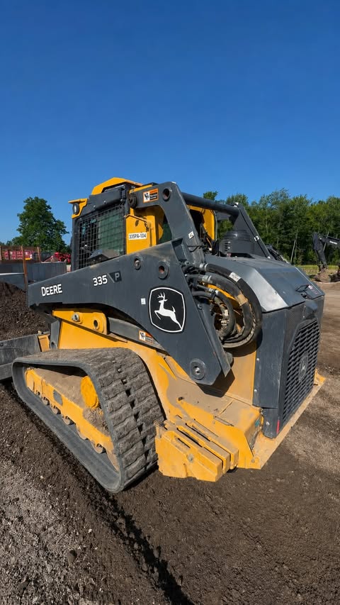 Instagram post by @bob_dietz_and_sons_inc for John Deere. Caption reads: The new John Deere 335 P-Tier is impressive! The....