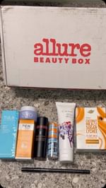 Instagram post by @rusky1415 for Allure. Caption reads: Unbox my latest Allure Beauty Box with me! It....
