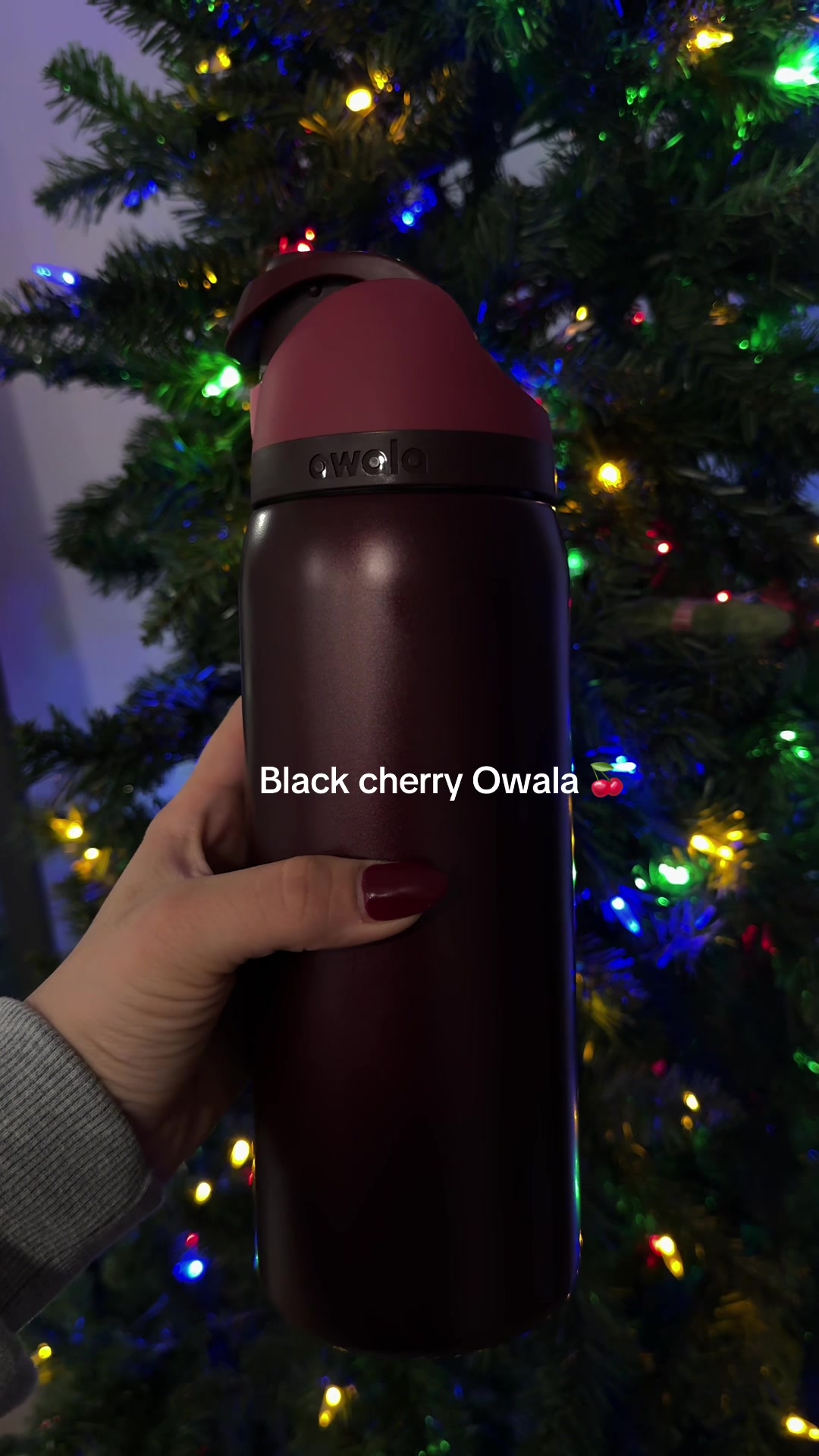 TikTok post by @by.asht for Owala. Caption reads: The perfect color for winter🍒 @Owala #blackcherry....
