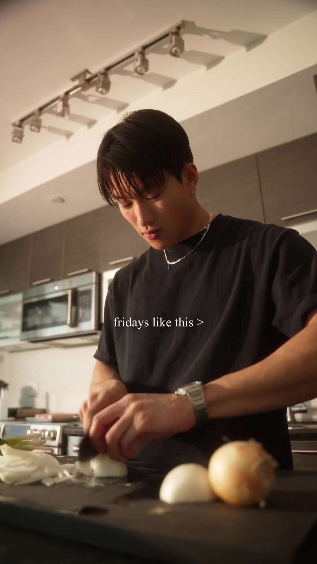 TikTok post by @kennylsong for bibigo USA. Caption reads: dinner w the boys 😮‍💨, thanks to @bibigo USA #ad....