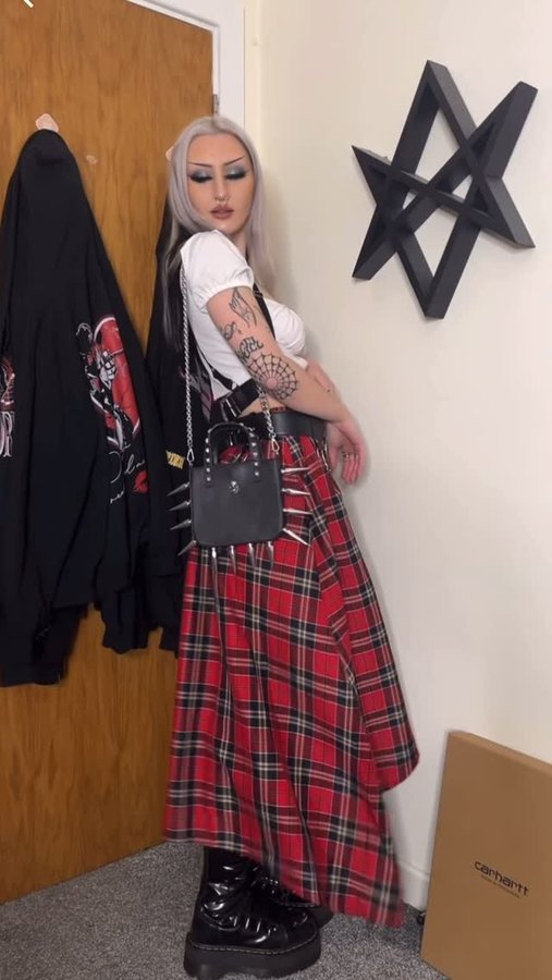 Instagram post by @paras1te.eve for Damaged Society. Caption reads: this is such a casual lowkey outfit 🖤

-harness....