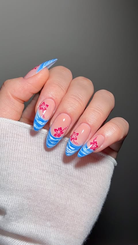 Instagram post by @softlux.nails for Modelones. Caption reads: [...] and hibiscus flowers ☀️🌺 shop the Modelones....