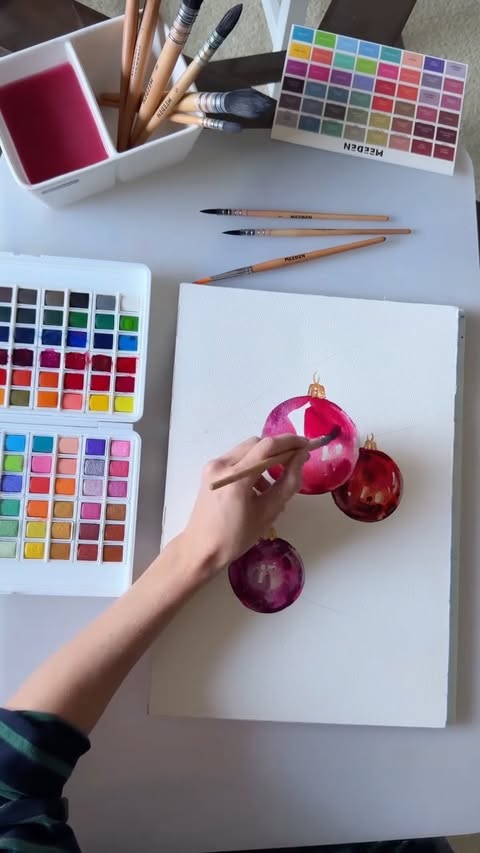 Instagram post by @anna_pole for MEEDEN ART. Caption reads: mood to draw 🎄❄️❤️
Meedem watercolor 

use the....