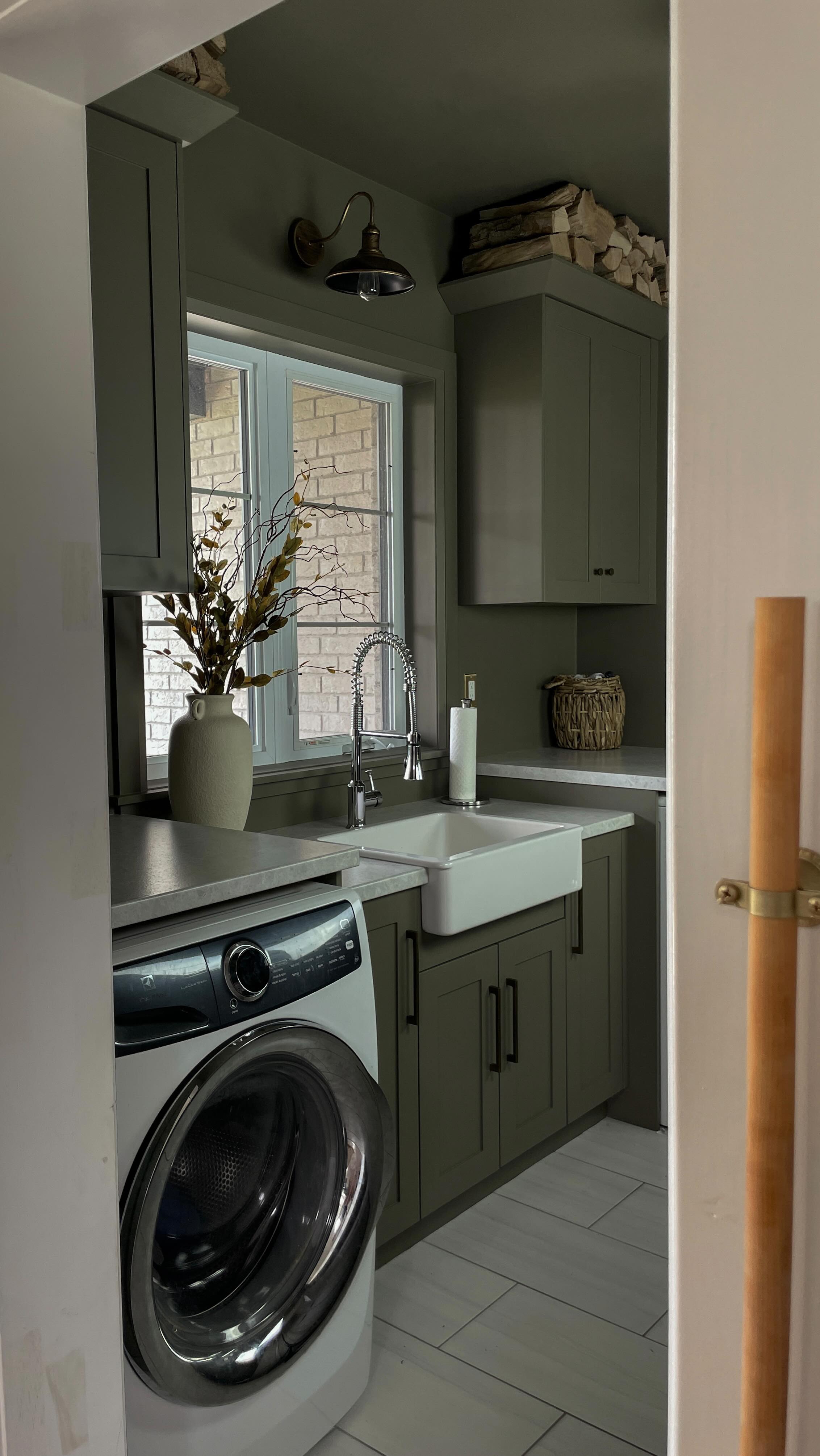 Instagram post by @athomewithcate for Residence Supply. Caption reads: [...] added the Makhraj Wall Lamp from....