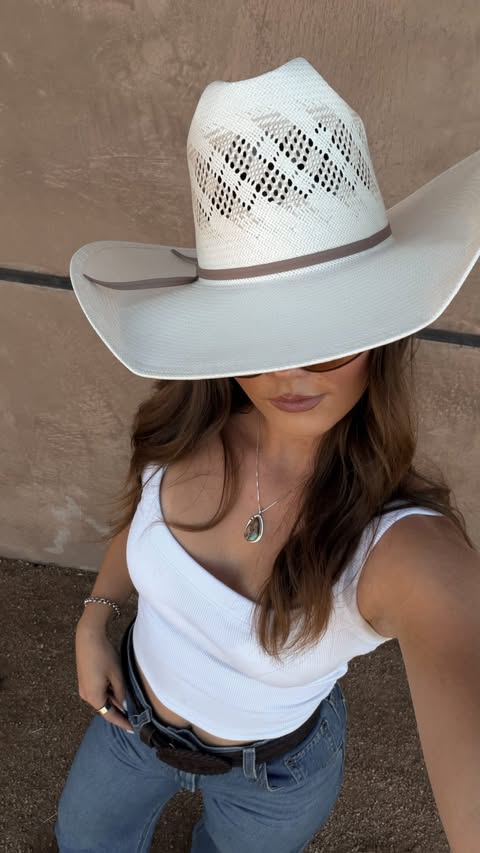 Instagram post by @juliastangler for Davines. Caption reads: so grateful for all of it🤎 #western #fashion #pr....