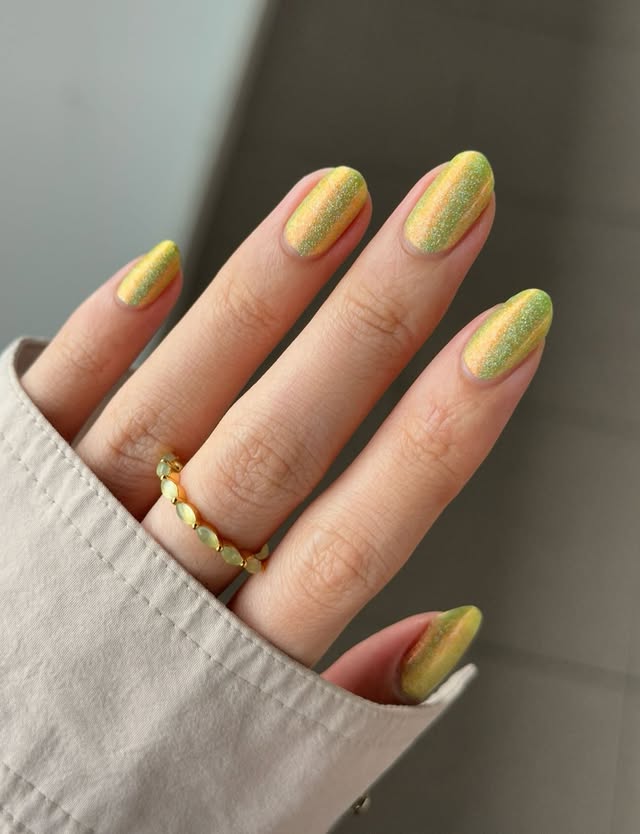 Instagram post by @natttynails for Caitlyn Minimalist. Caption reads: This SUPER cute & glowy green polish is one of my....