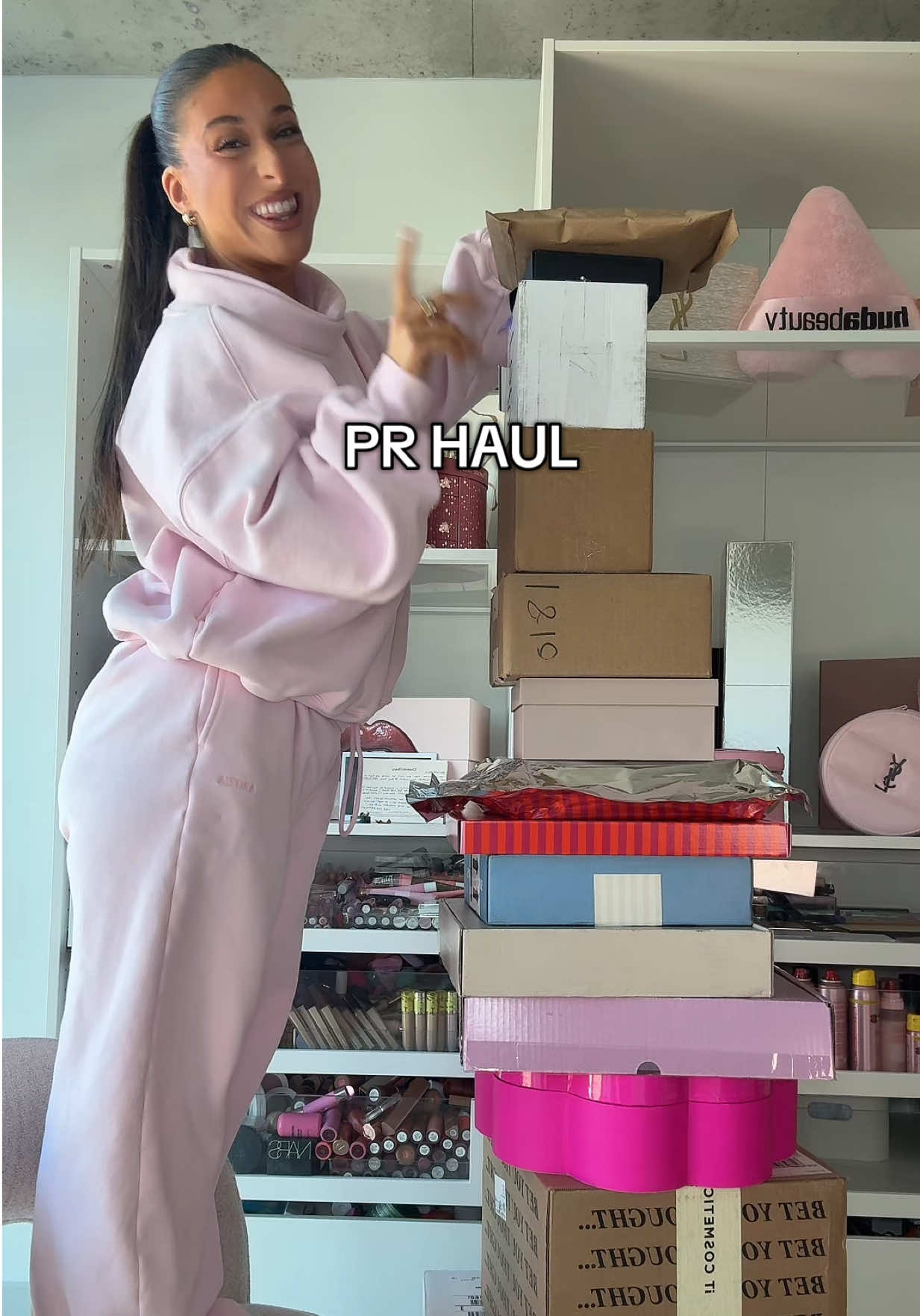 TikTok post by @allierosss for Amika. Caption reads: PR HAUL @Ulta Beauty @IT Cosmetics @amika @Olaplex....