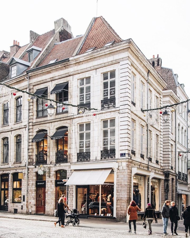 Instagram post by @noepierre for Passion Passport. Caption reads: Strolls through Vieux-Lille can’t get boring 💛 By....