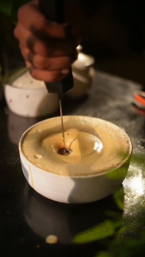 Instagram post by @nd_bites for Akshayakalpa Organic. Caption reads: High Protein Cold Coffee ☕⚡ | No Protein Powder!....