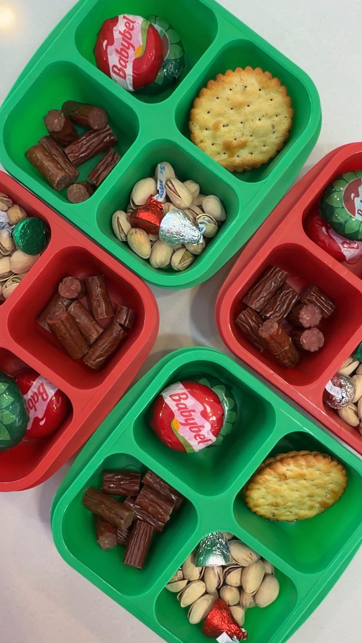 Instagram post by @caitliniola for Chomps. Caption reads: Holiday themed snack box restock 🎄....