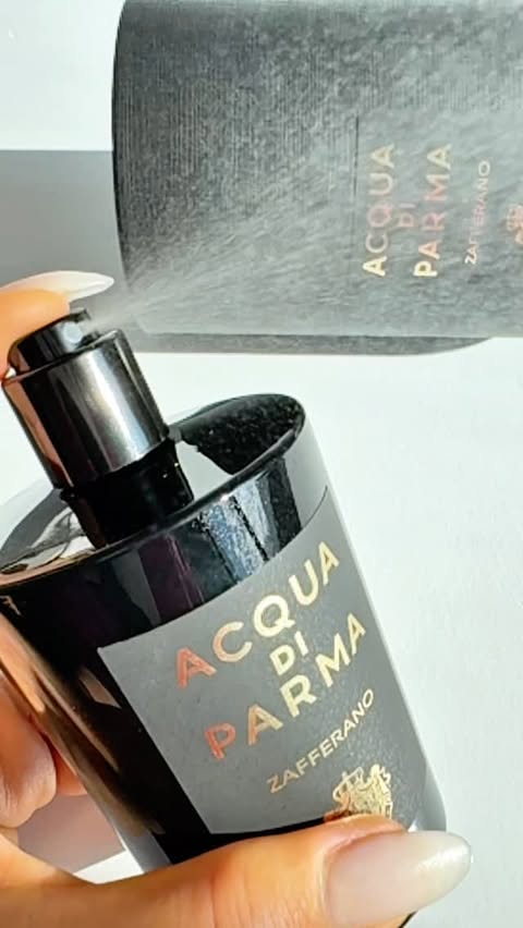 Instagram post by @lidalechic for Acqua di Parma. Caption reads: ASMR Unboxing 📣💫 Acqua di Parma Zafferano Eau de....