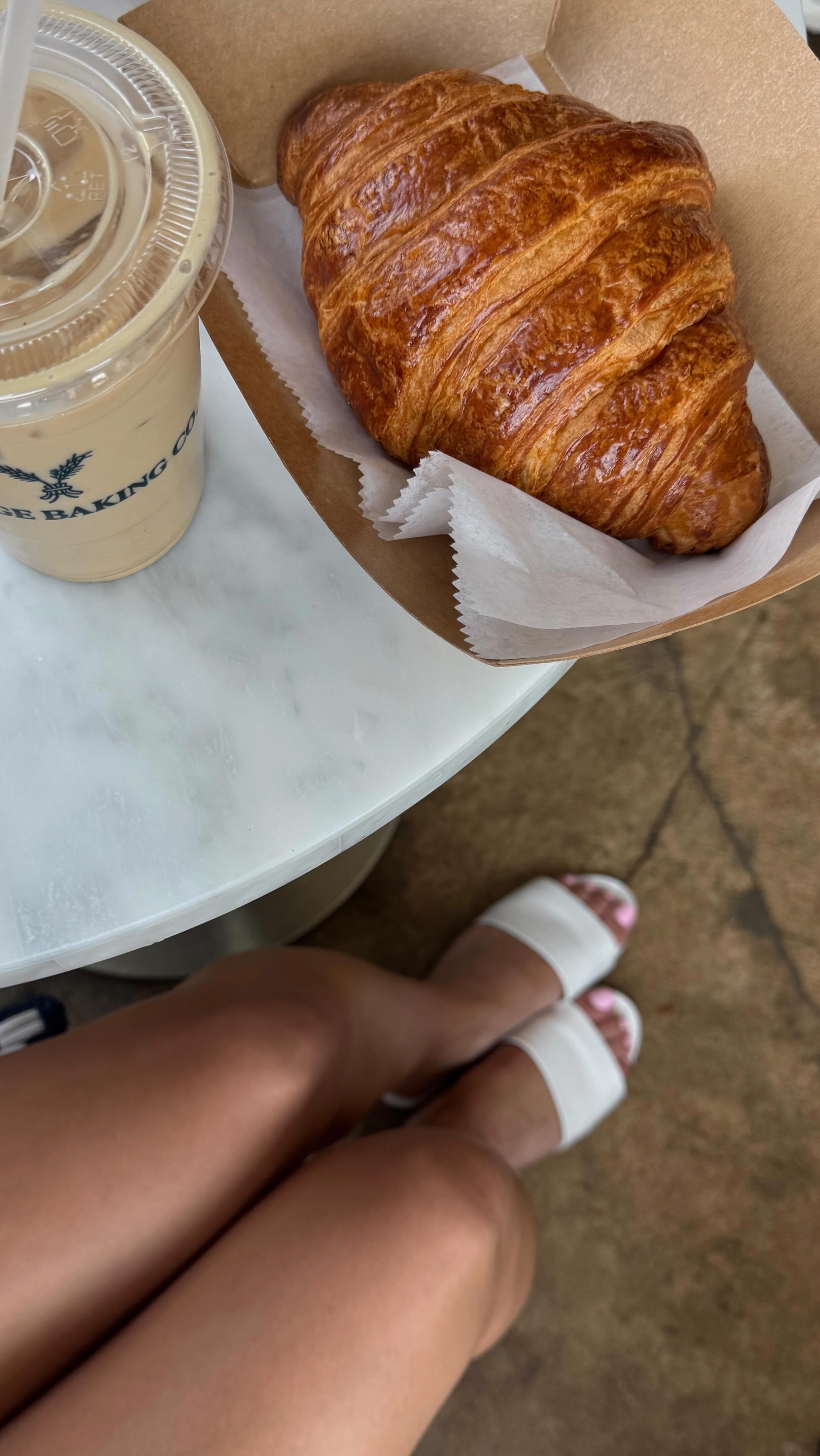 Instagram post by @danimcginnis for Vince Camuto. Caption reads: Summer in @vincecamuto 🥐🩵☕️✨ #ad.