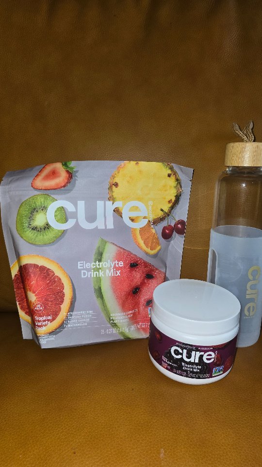 Instagram post by @da.jackson.trio for Cure Hydration. Caption reads: [...] for this bundle. #gifted #Cure....