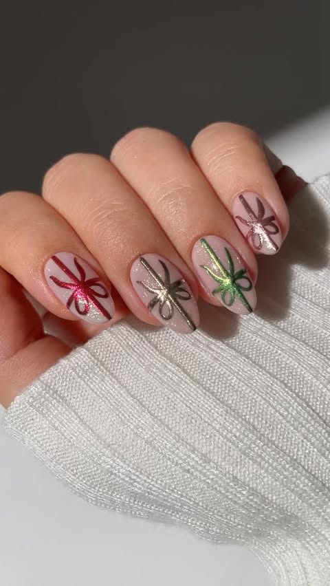 Instagram post by an influencer for MYLEE | AT-HOME GEL NAILS. Caption reads: ad • cute and colourful chrome bows for....