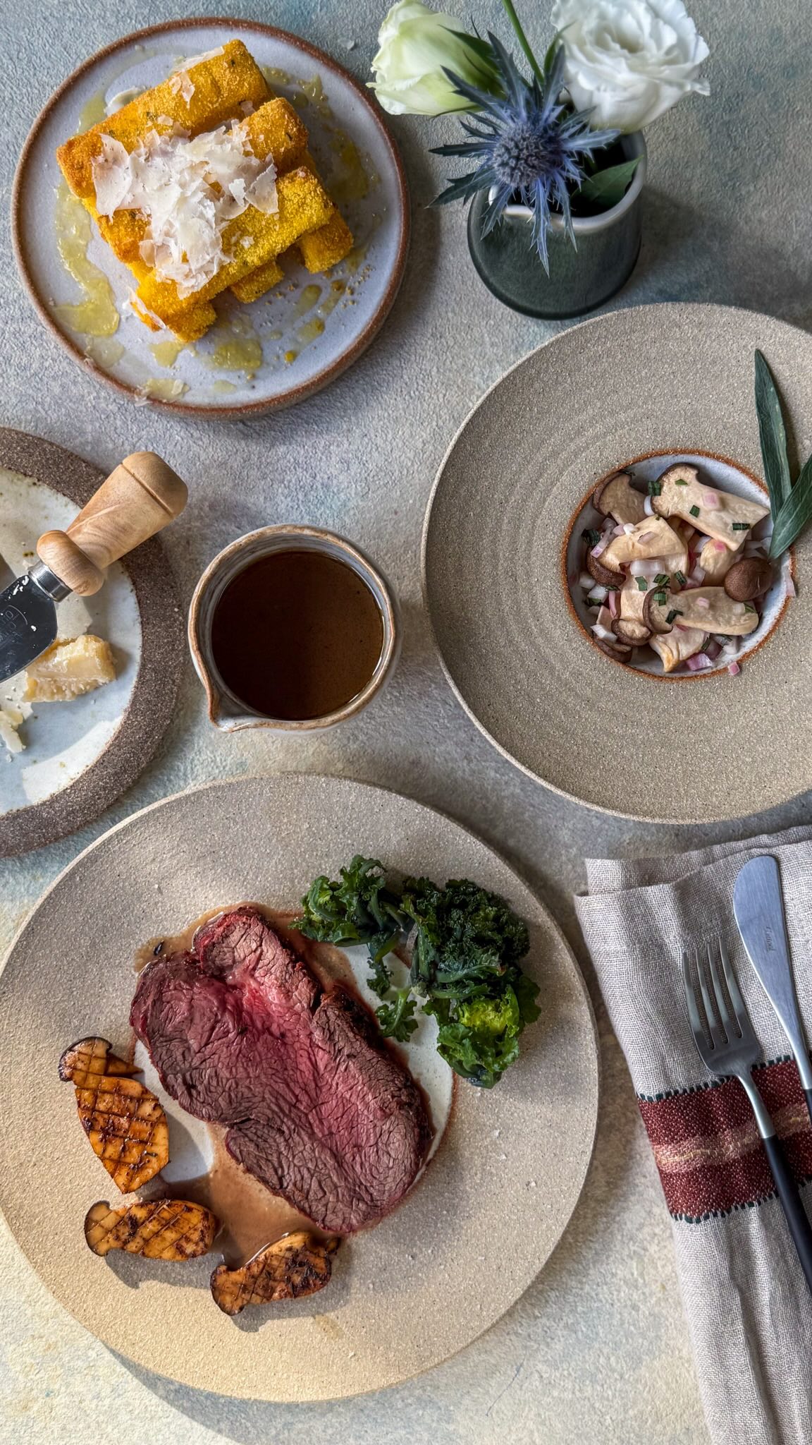 Instagram post by @thecornerplot for Parmigiano Reggiano. Caption reads: [...] exquisite Angus beef with Parmigiano....