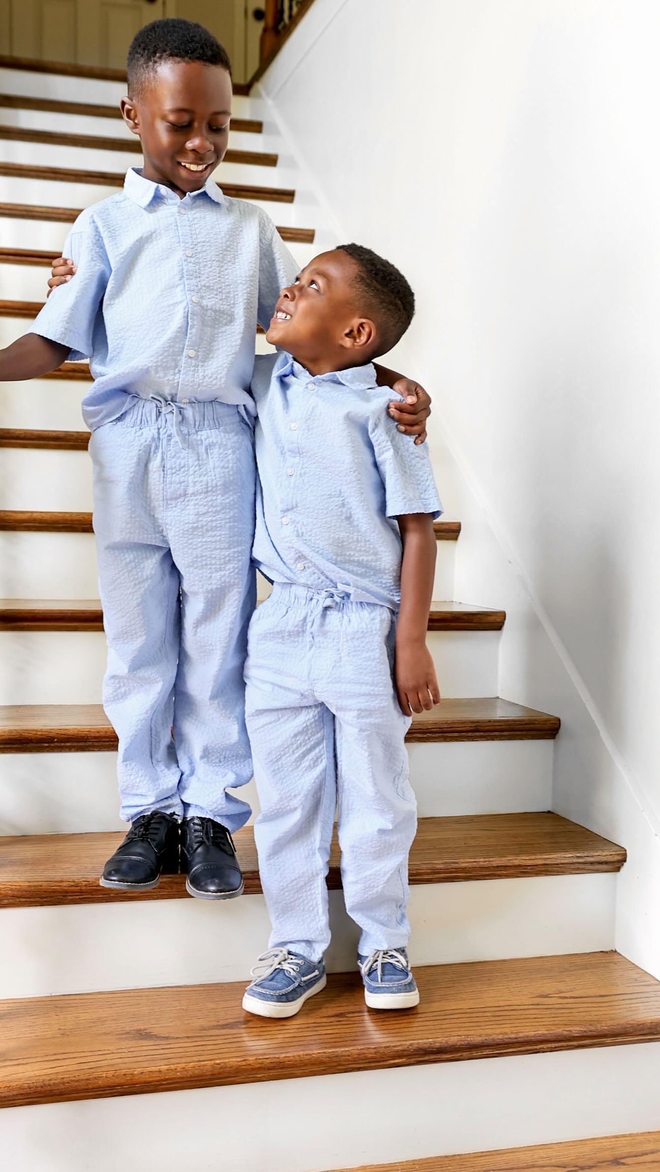 Instagram post by @funmiford for INFINITI USA. Caption reads: Raising men your daughters won’t have to complain....