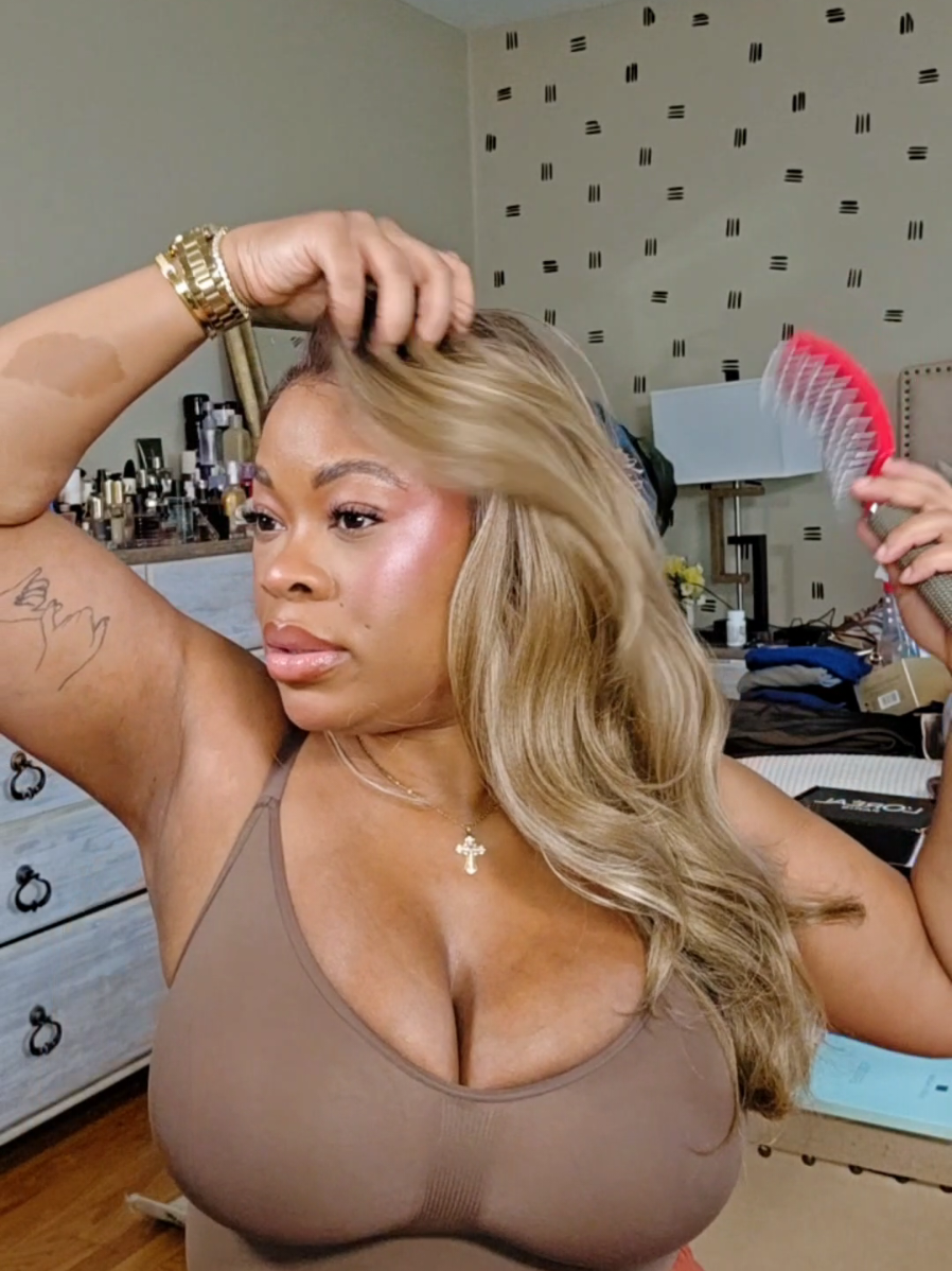 TikTok post by @brittbratstyles for Curlyme. Caption reads: I just keep quiet #wigreview #wigs #syntheticwig....