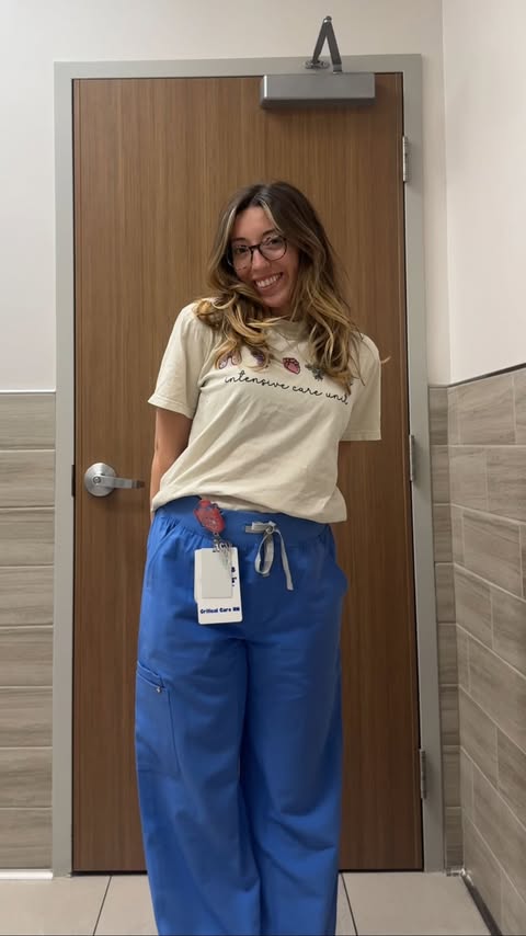 Instagram post by @nurse.maddi for FIGS. Caption reads: [...] body and baby !!! 
.
.
.
.
.
.
#wearfigs....