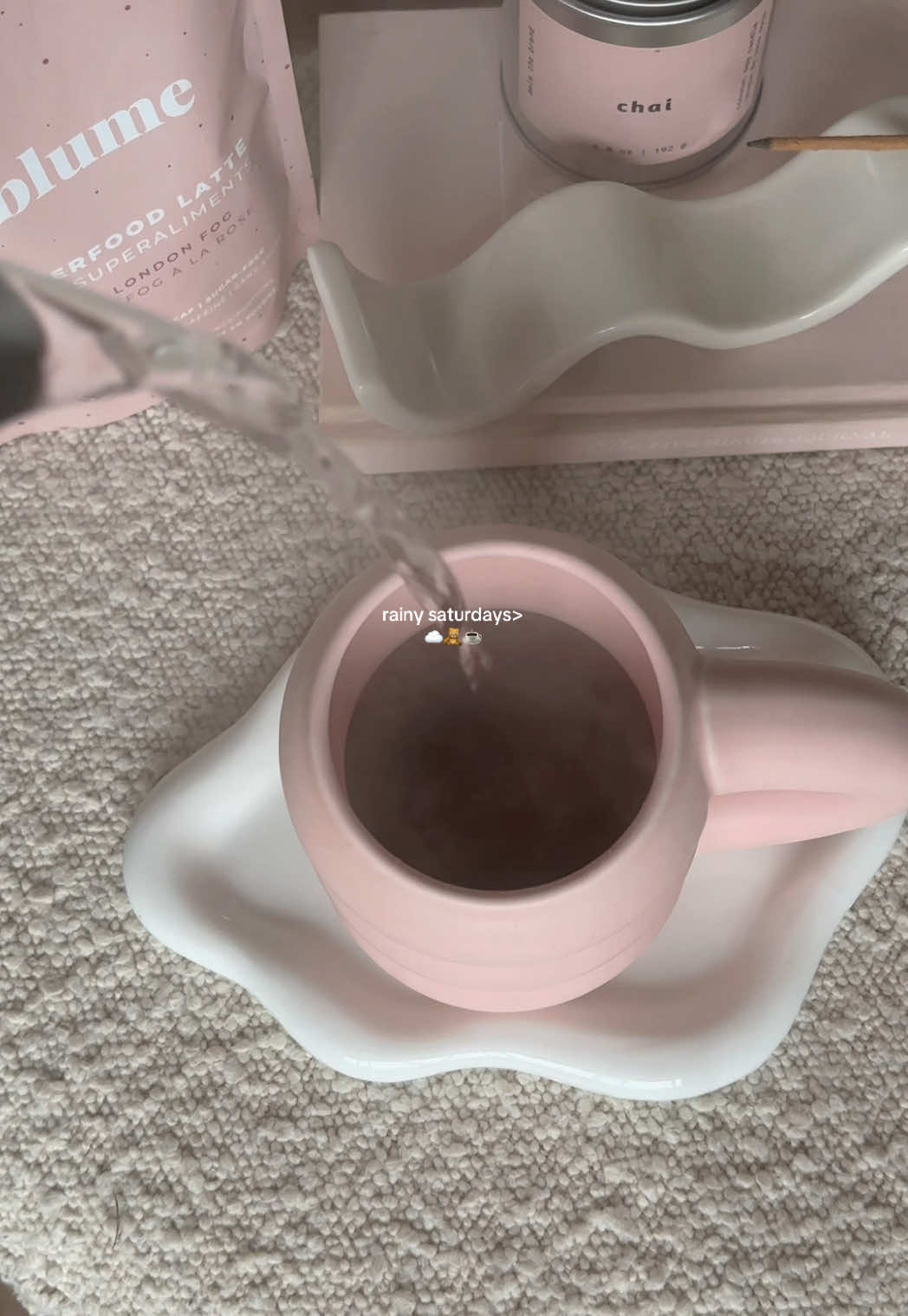 TikTok post by @cozysonzy for SALT & STONE. Caption reads: cozy saturday nights as a homebody> 🌧️🫧 ....