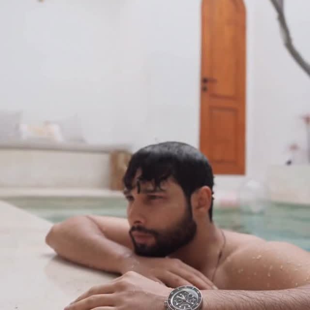 Instagram post by @siddhantchaturvedi for Michael Kors. Caption reads: Vacation mode, elevated with....