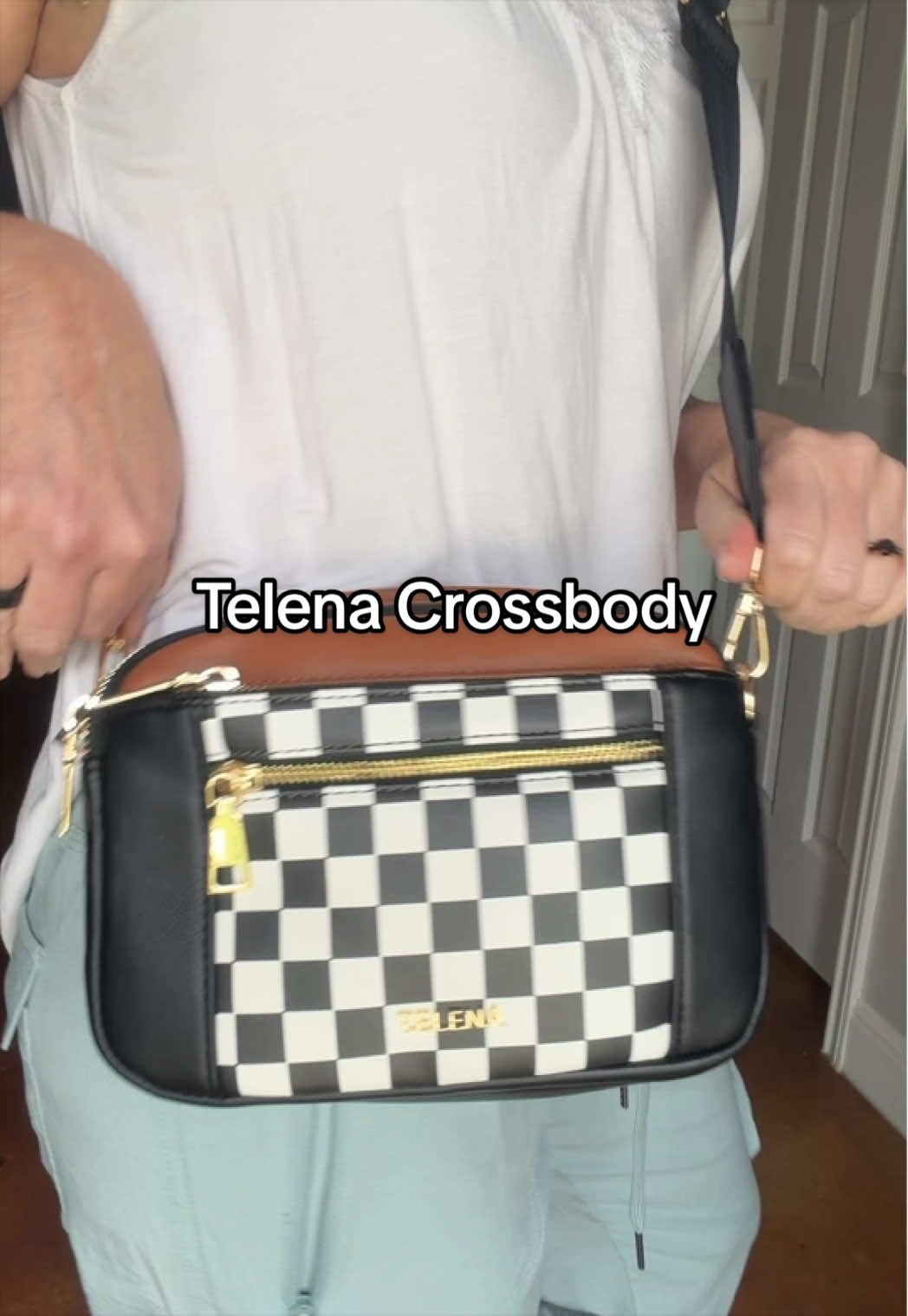 TikTok post by @happier_shannon for Affiliasi Pikaru. Caption reads: The perfect small trendy cross body. Fits....