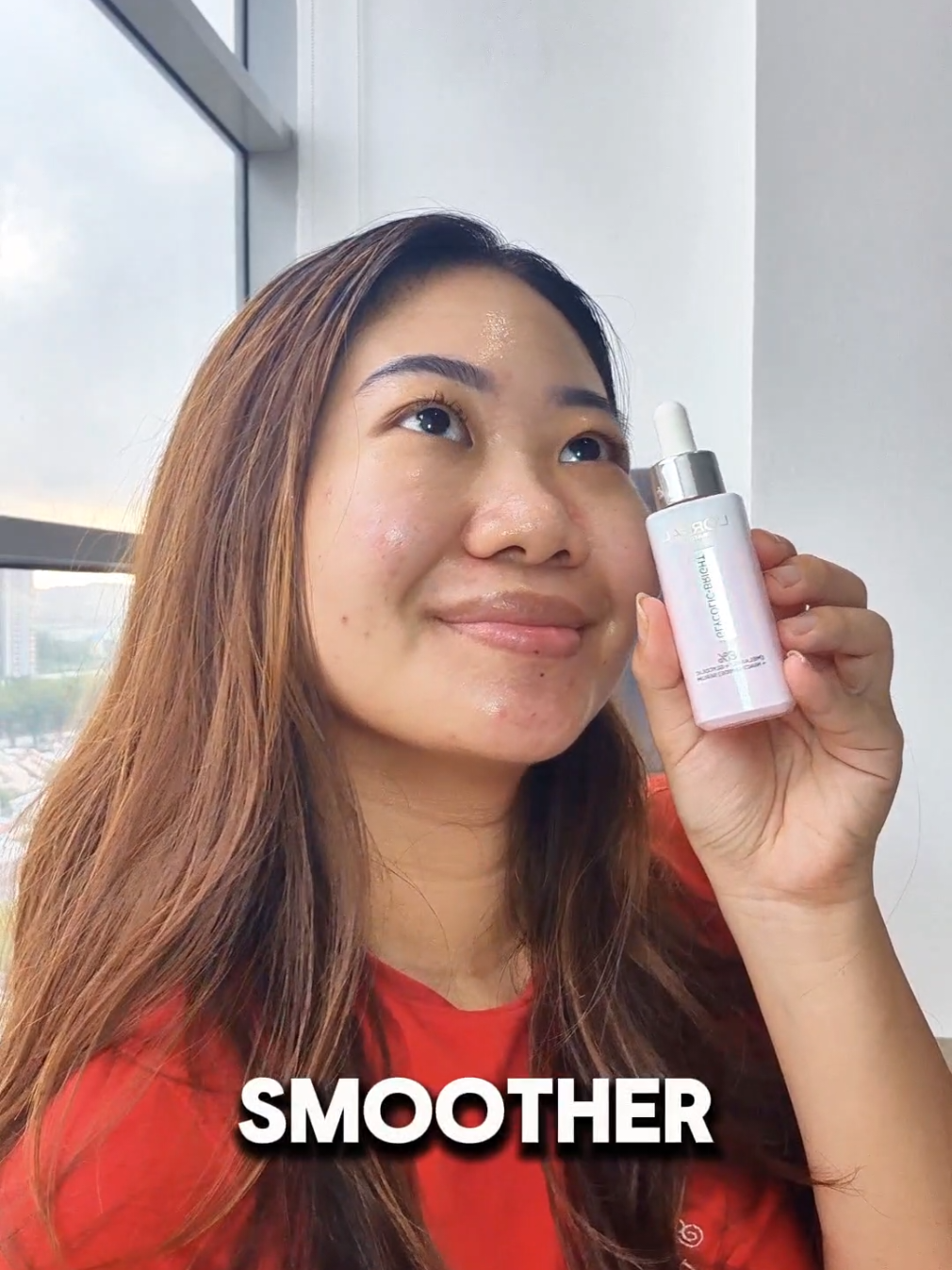TikTok post by @marcelinaaw_ for L’Oréal Paris Malaysia. Caption reads: Brighter, clearer, more radiant-looking skin....