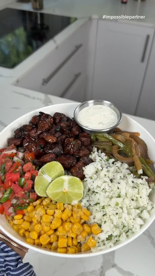 Instagram post by @themoodyfoody for Impossible Foods. Caption reads: These bowls made with Impossible® Steak Bites From....