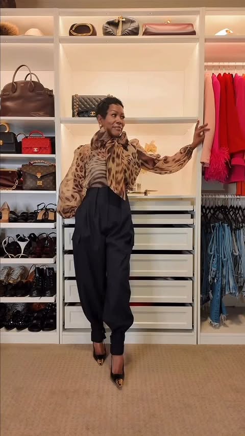 Instagram post by @iamelittle for RETROFÊTE. Caption reads: Turning heads in this statement blouse ✨ Bold....