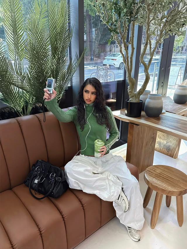 Instagram post by @laylahmelamed for Urban Outfitters. Caption reads: it’s greener over here @urbanoutfitters #uopartner....