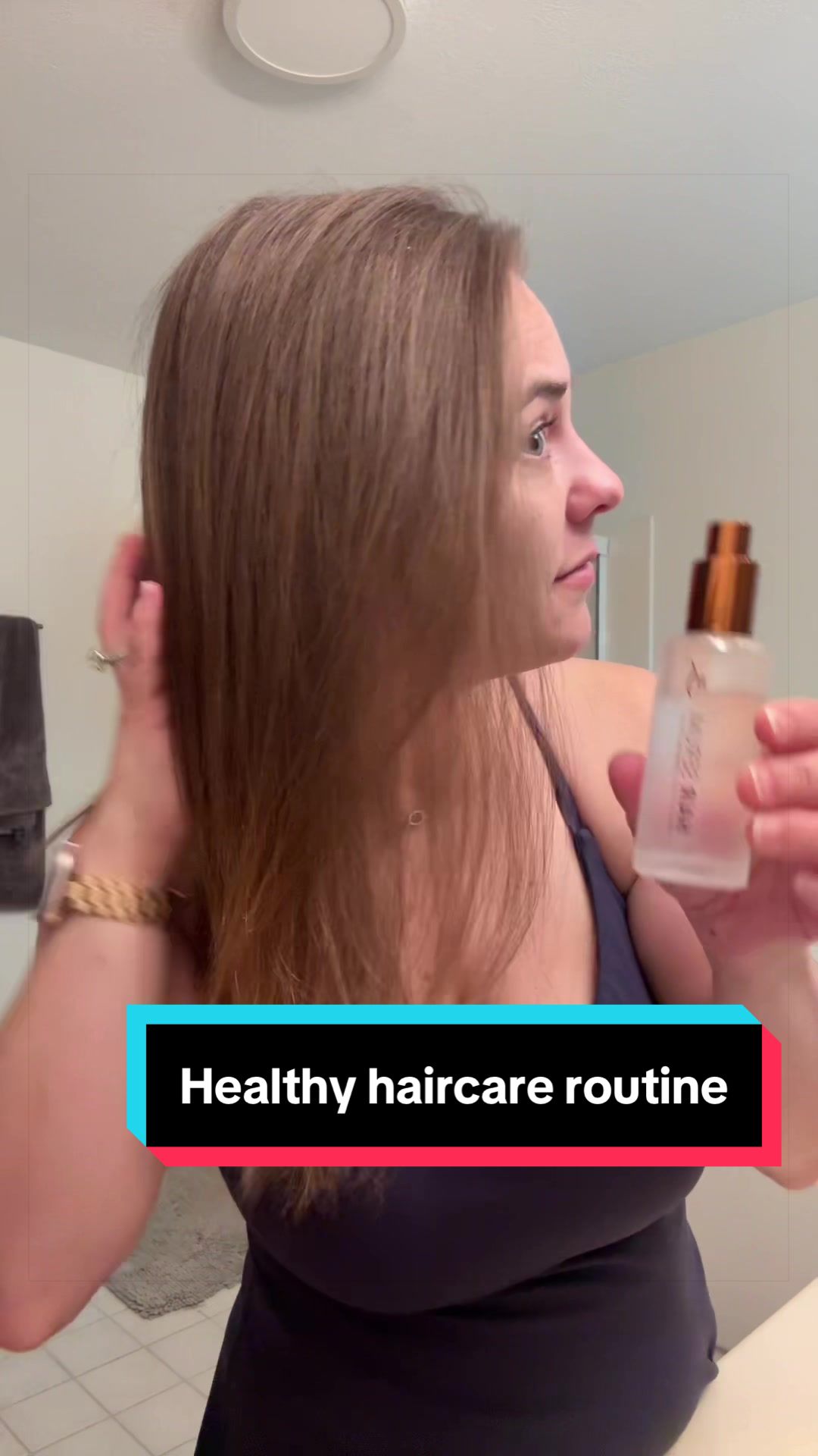 TikTok post by @ashleylendrum for HerStyler Haircare. Caption reads: My hair is loving this hair serum & it’s done....