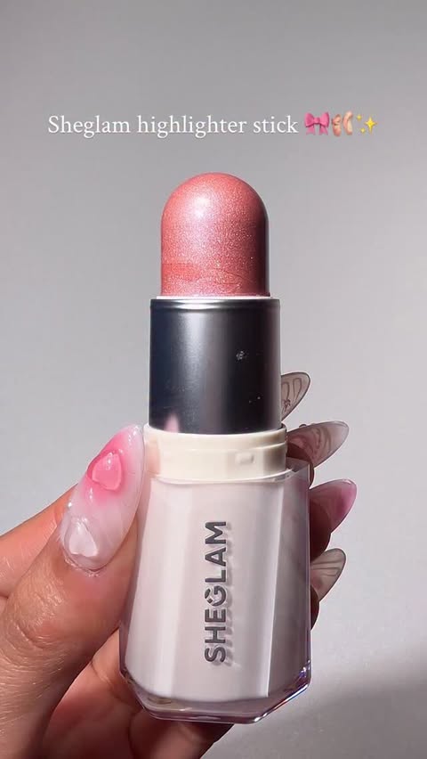 Instagram post by @sairasglam for SHEGLAM. Caption reads: @sheglam_official buttery bling highlighter stick....