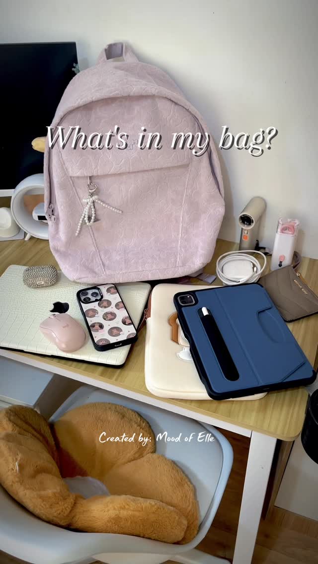 Instagram post by @moodofelle for Michael Kors. Caption reads: Workday essentials 💻💼 

#workday #working....